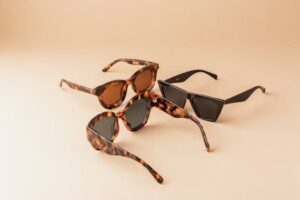 News A modern display of three elegant sunglasses, perfect for summer fashion.